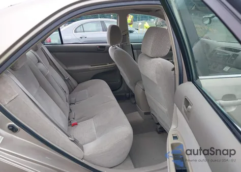 2002 Toyota Camry Le from USA, damaged, VIN 4T1BE30K42U106391